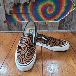 Vans animal print slip ons, size 9.5 shoes.